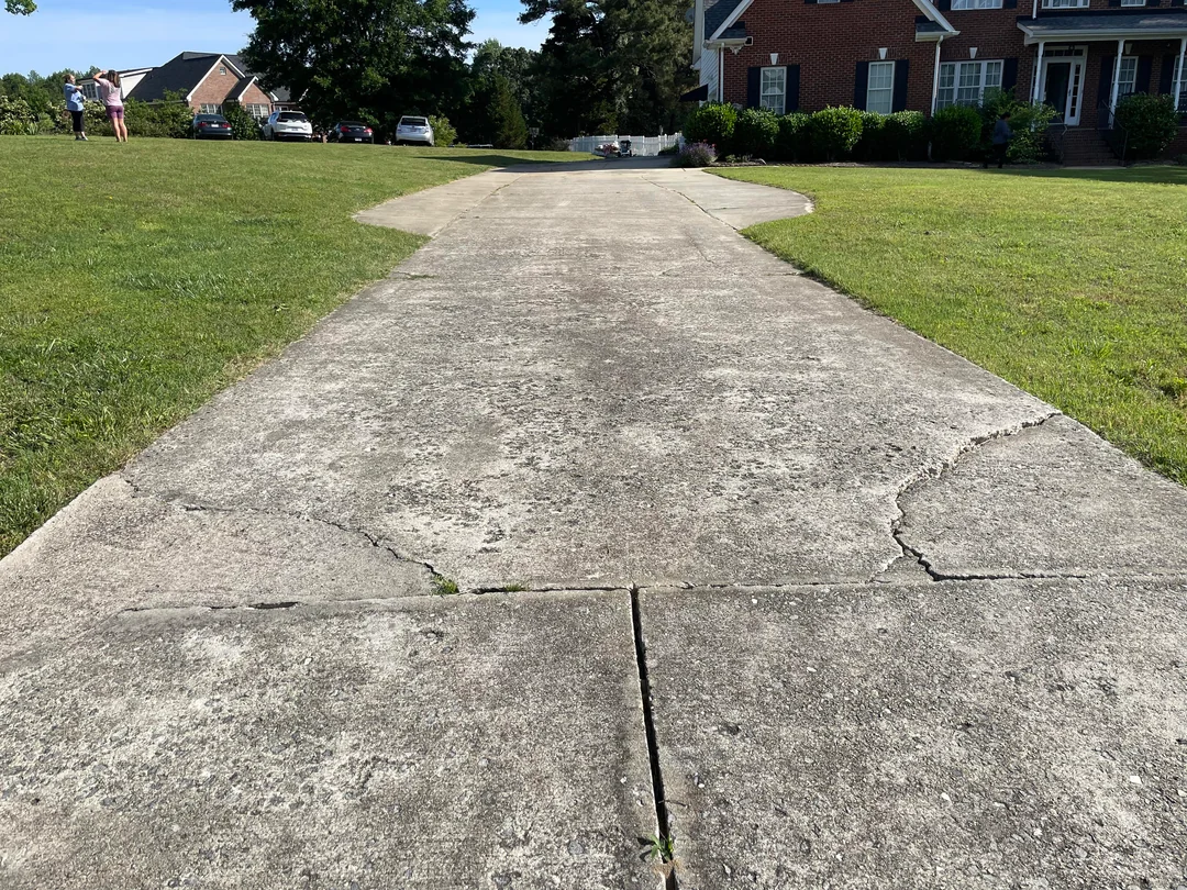 Clean driveway after power washing